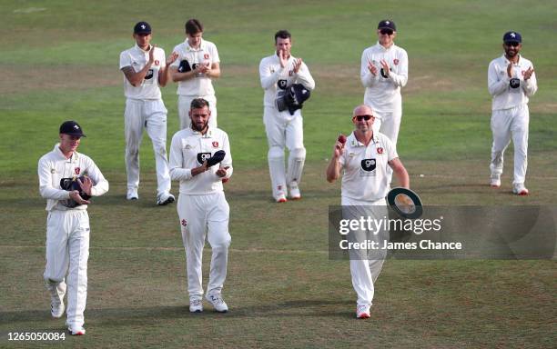 Jordan Cox , Jack Leaning and Darren Stevens of Kent are applauded off by their team mates for the respective performances in helping Kent defeat...