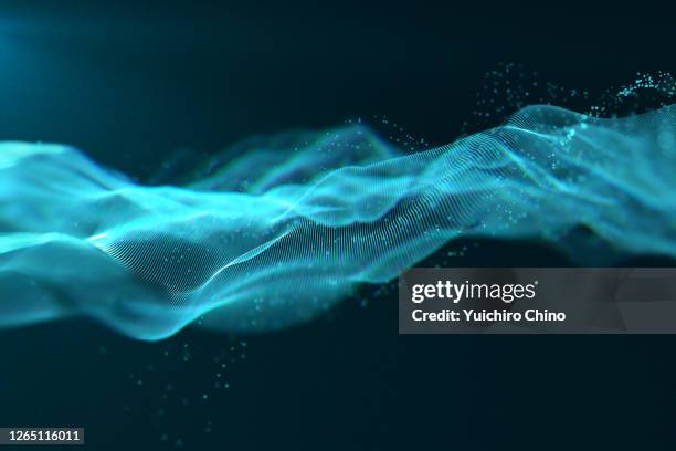 digital data of particle wave - flowing particles stock pictures, royalty-free photos & images