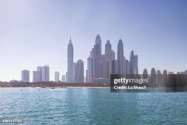 urban skyline and skyscrapers in dubai marina. - expo 2020 dubai ストックフォトと画像