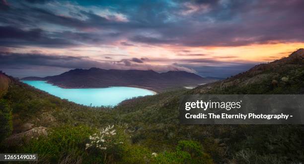 the magnificent wineglass bay, freycinet national park, tasmania at dusk - wineglass bay stock pictures, royalty-free photos & images