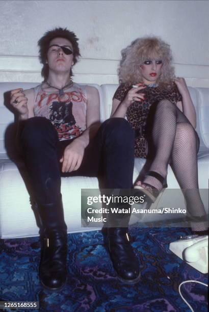 Sid Vicious of the Sex Pistols, wearing an eye patch, with Nancy Spungen at their flat in London, UK, 4th August 1978.