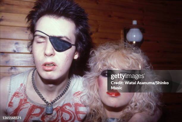 Sid Vicious of the Sex Pistols, wearing an eye patch, with Nancy Spungen at their flat in London, UK, 4th August 1978.