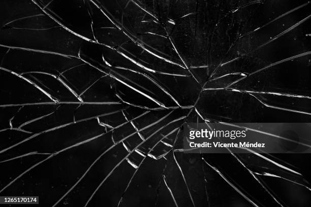 Arrangement Ond violet 163 Cracked Glass Black Background Photos and Premium High Res Pictures -  Getty Images