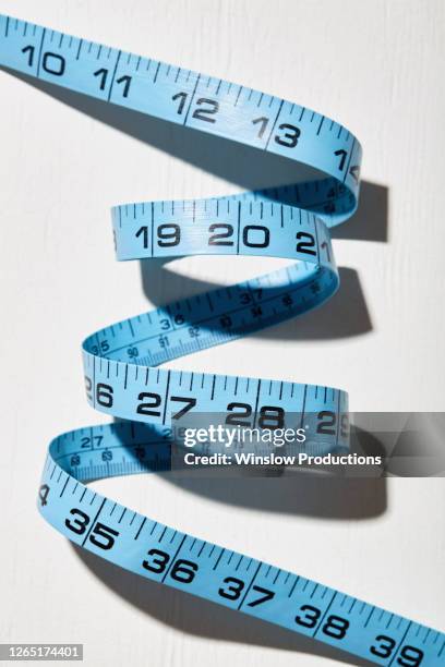 blue measuring tape - centimeter stockfoto's en -beelden