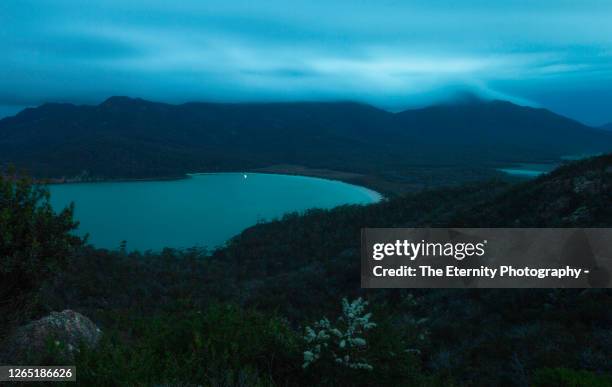 the magnificent wineglass bay, freycinet national park, tasmania - wineglass bay stock pictures, royalty-free photos & images