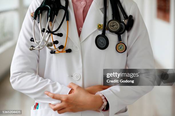 Hospital doctor with stethoscope. Cardiology. Ho Chi Minh City. Vietnam.