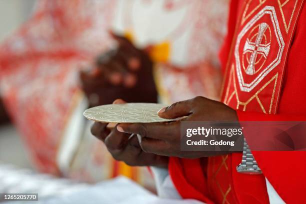 African church. Sunday catholic mass. Eucharist celebration. Agbonou Koeroma. Togo.