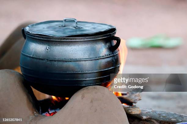 African kitchen in a village. Cooking pot on fire. Datcha-Attikpaye. Togo.