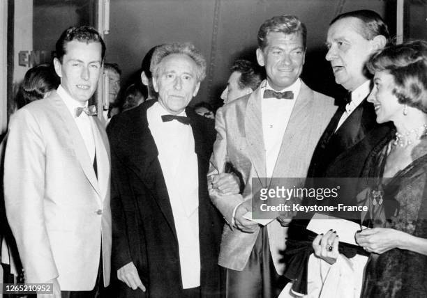 Cannes Festival. From right to left) : Francine WEISWEILLER, the composer Georges AURIC, actor Jean MARAIS, his lover the writer Jean COCTEAU and the...