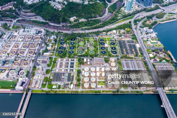 drone view of sha tin sewage treatment works - shatin stock pictures, royalty-free photos & images