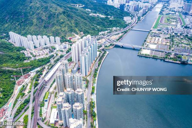 drone view of sha tin sewage treatment works - shatin stock pictures, royalty-free photos & images