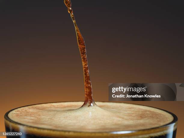 coffee pour in cup - milk stream stock pictures, royalty-free photos & images