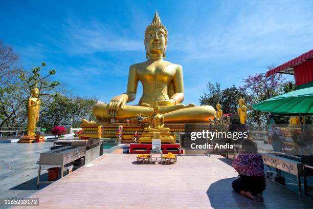 Meter high Big Buddha golden statue and Buddhist temple located on top of the Khao Phra Tamnak hill, between South Pattaya and Jomtien.