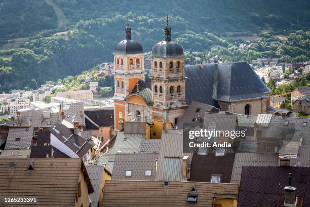 Briancon : rooftop view of the old town and the Parish Church of Notre-Dame-et-Saint-Nicolas, building registered as a Natiional Historic Landmark .