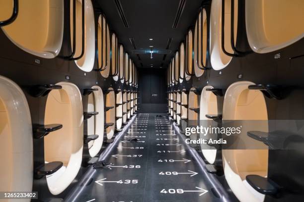 Nine Hours Shinjuku North capsule hotel, Shin Okubo. Basic sleeping accommodation in confined spaces in shared dormitories, one-night stand-by...