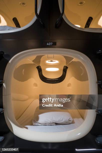 Nine Hours Shinjuku North capsule hotel, Shin Okubo. Basic sleeping accommodation in confined spaces in shared dormitories, one-night stand-by...