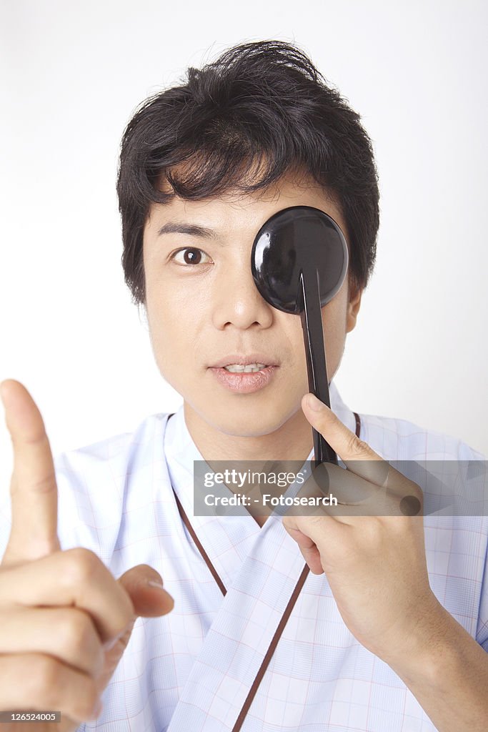 Man taking an eye test