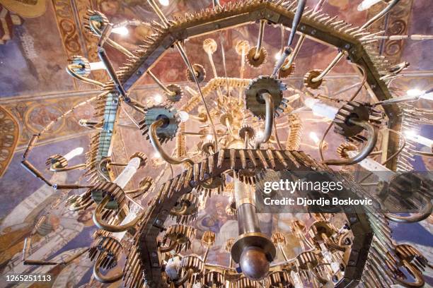 chandelier with bullets in church ruzica - belgrade fortress stock pictures, royalty-free photos & images