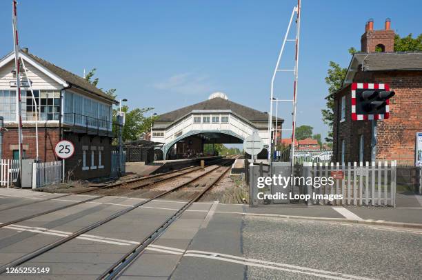 Level crossing and station.