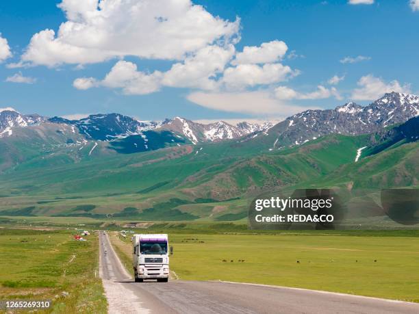 The Tien Shan Highway connecting Bishkek with Osh. The Suusamyr plain, a high valley in Tien Shan Mountains. Asia, central Asia, Kyrgyzstan.
