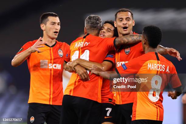 Taison of Shakhtar Donetsk celebrates with teammates after scoring his sides second goal during the UEFA Europa League Quarter Final between Shakhtar...