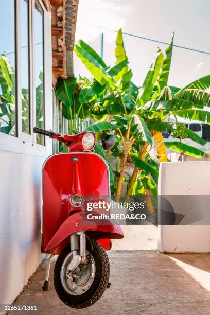 Old Vespa Piaggio motorcycle, Salina island, Aeolian Islands, Sicily, Italy, Europe.