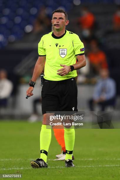 Referee Michael Oliver looks on during the UEFA Europa League Quarter Final between Shakhtar Donetsk and FC Basel at Veltins-Arena on August 11, 2020...