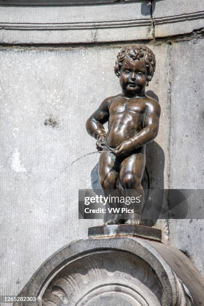 The iconic Manneken Pis statue in Brussels, Belgium.