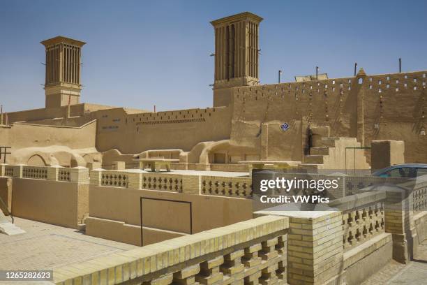 Windtowers or badgirs and city wall. Yazd, Iran, Asia.