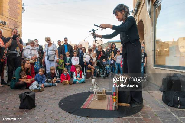 Marionette show in a street of the town of Charleville-Mezieres within the framework of the World Puppet Theatre Festival on September 20, 2019.