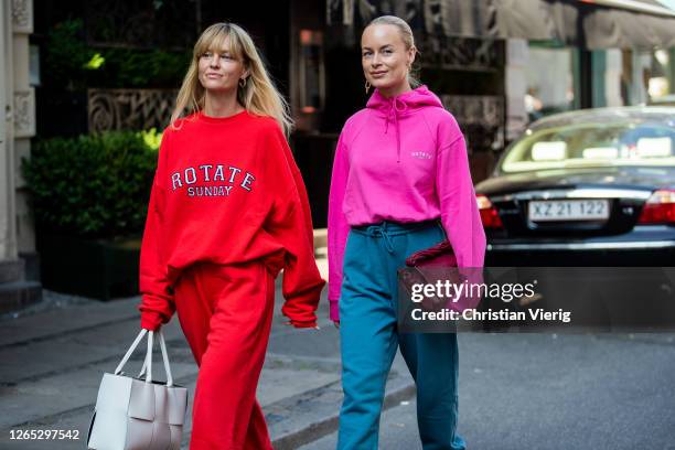 Thora Valdimars and Jeanette Friis Madsen seen wearing Rotate jogger pants, hoody and sweater outside Lovechild 1979 during Copenhagen Fashion Week...