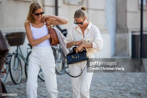 Guests seen outside Remain Birger Christensen during Copenhagen Fashion Week Spring/Summer 2021 on August 11, 2020 in Copenhagen, Denmark.