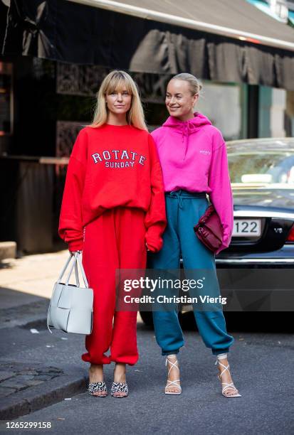 Thora Valdimars and Jeanette Friis Madsen seen wearing Rotate jogger pants, hoody and sweater outside Lovechild 1979 during Copenhagen Fashion Week...