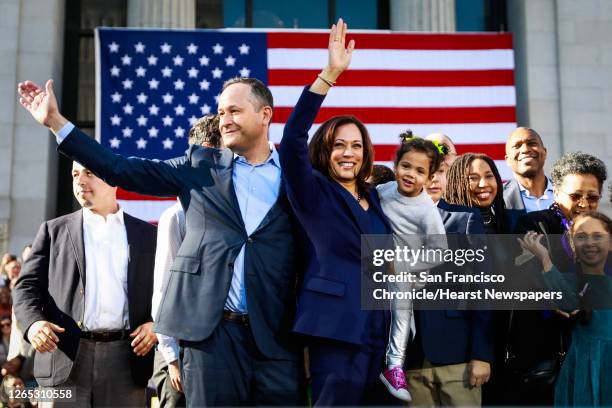 Senator Kamala Harris holds her niece Amara as she and her husband Douglas Emhoff wave to the crowd after holding her first presidential campaign...
