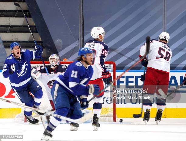 Ondrej Palat of the Tampa Bay Lightning celebrates after Brayden Point scored the game winning goal at 10:27 in the fifth overtime to win Game One of...