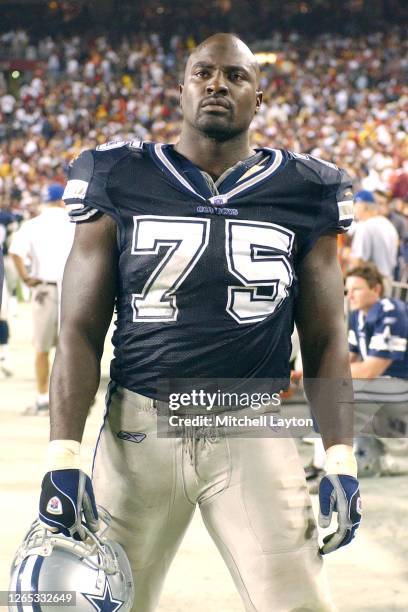 Marcellus Wiley of the Dallas Cowboys looks on during a NFL football game against the Washington Redskin on September 27, 2004 at FedExField in...