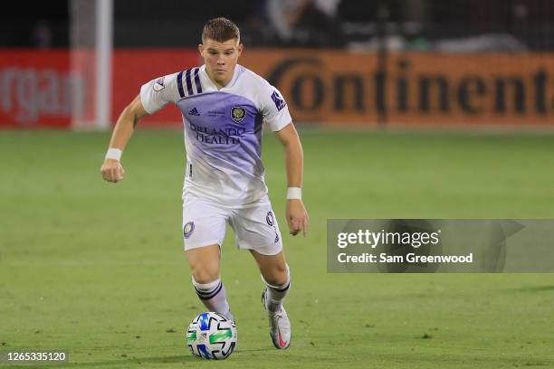 Chris Mueller of Orlando City controls the ball during the final match of MLS Is Back Tournament between Portland Timbers and Orlando City at ESPN...