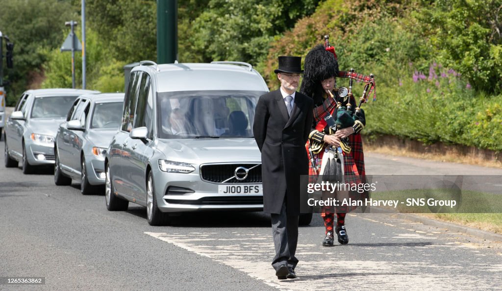 The funeral cortege makes its way to the service for Scotland legend ...