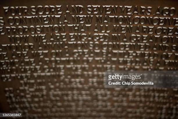 President Abraham Lincoln's Gettysburg Address is displayed in bronze at the memorial to the speech near the gate of the Soldiers' National Cemetery,...