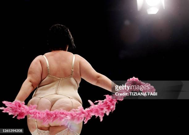 Contestant takes part in the 18th beauty contest "Miss Cicciona", held every year at Forcoli near Pisa in Tuscany, 23 July 2006.