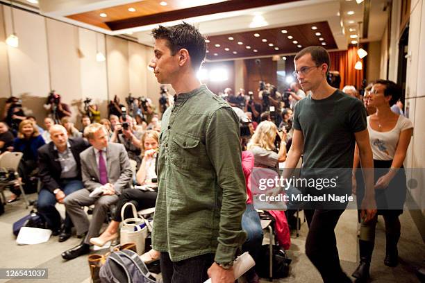 Josh Fattal and Shane Bauer , two American hikers released after spending more than two years imprisoned in Iran, walk into a press-filled conference...