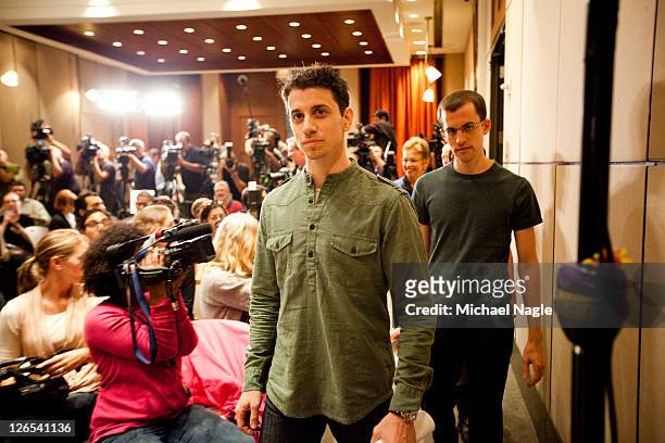 Josh Fattal and Shane Bauer , two American hikers released after spending more than two years imprisoned in Iran, walk into a press-filled conference...