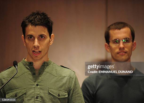 Shane Bauer and Josh Fattal, two US hikers held by Iran for more than two years on spying charges, give a press conference after arriving back in the...