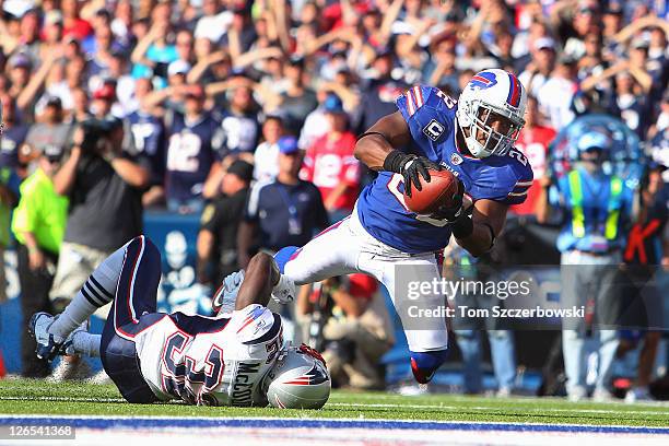 Fred Jackson of the Buffalo Bills is tackled at the 1-yard line by Devin McCourty of the New England Patriots late in the fourth quarter at Ralph...