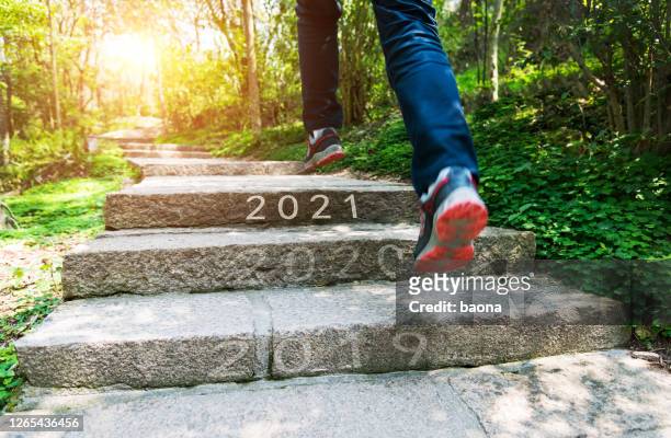 number of 2019 to 2021 on stones footpath - new year new you 2019 stock pictures, royalty-free photos & images