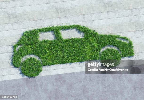 green car - coche eléctrico coche de combustible alternativo fotografías e imágenes de stock