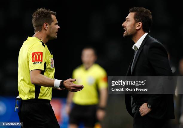 Tony Popovic, manager of the Glory, has words with Referee Chris Beath during the round 24 A-League match between the Perth Glory and Western United...