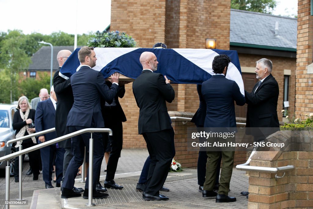 is pictured at the funeral service for Scotland legend Gordon McQueen ...