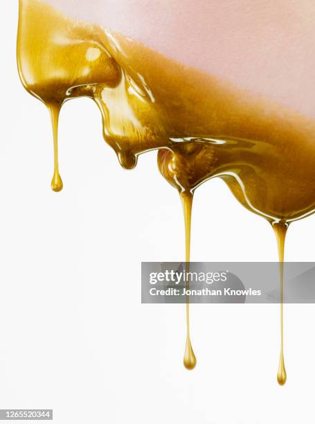 gold makeup - slime stock pictures, royalty-free photos & images