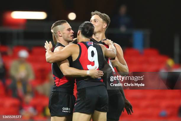 David Zaharakis of the Bombers celebrates a goal during the round 11 AFL match between the Gold Coast Suns and the Essendon Bombers at Metricon...